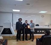 Engelsiz Yaşam Programı Kapsamında Arş. Gör. Huzeyfe Aydın’a Plaket Takdimi